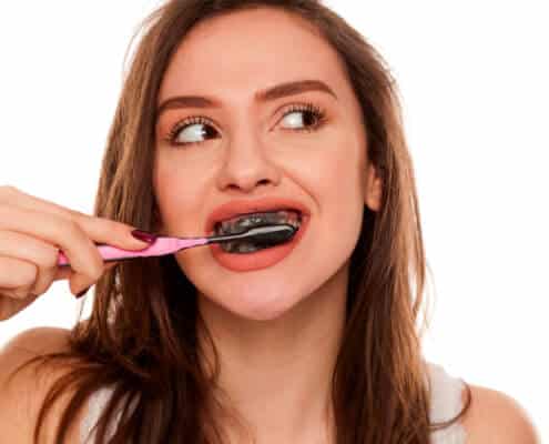 Brushing Teeth With Charcoal