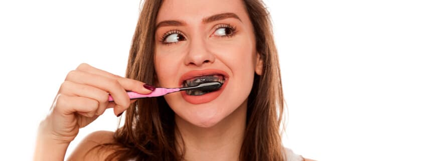 Brushing Teeth With Charcoal