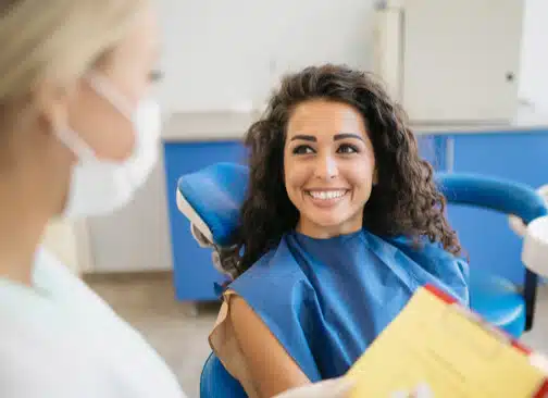 A Woman Smiling With A Set Of White Teeth A Woman Smiling With A Set Of White Teeth